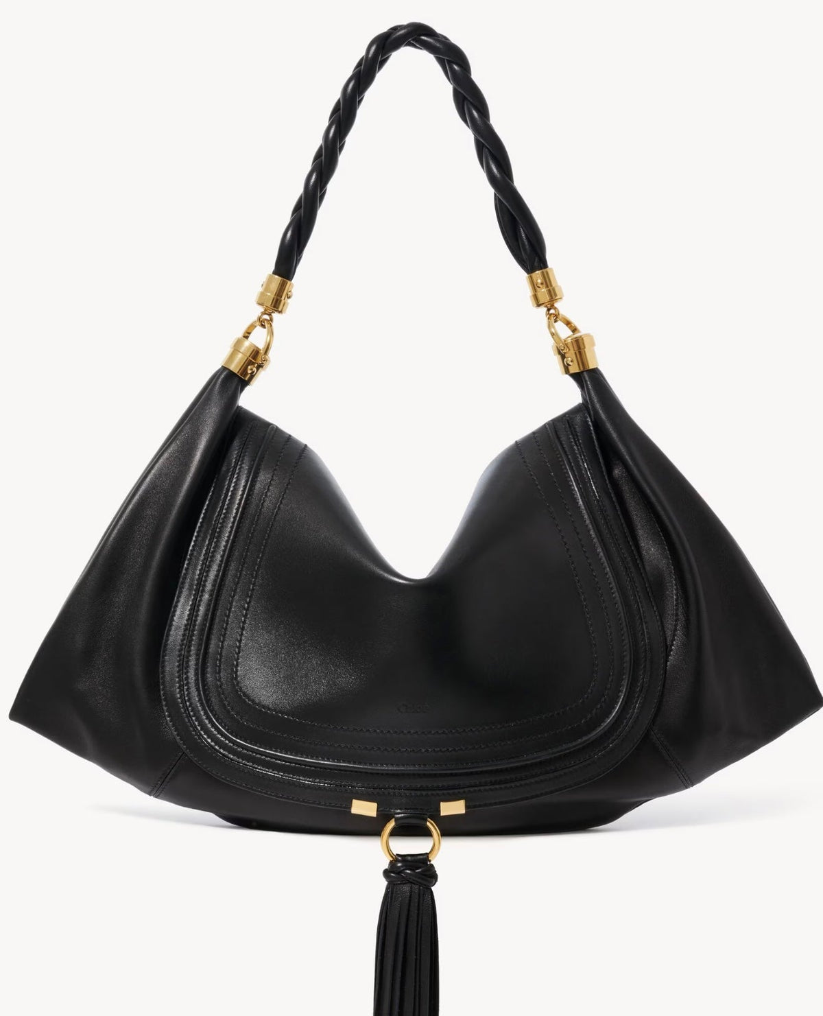 Black Chloé Marcie bag with a curved stitched front panel, braided handle and gold-tone hardware.