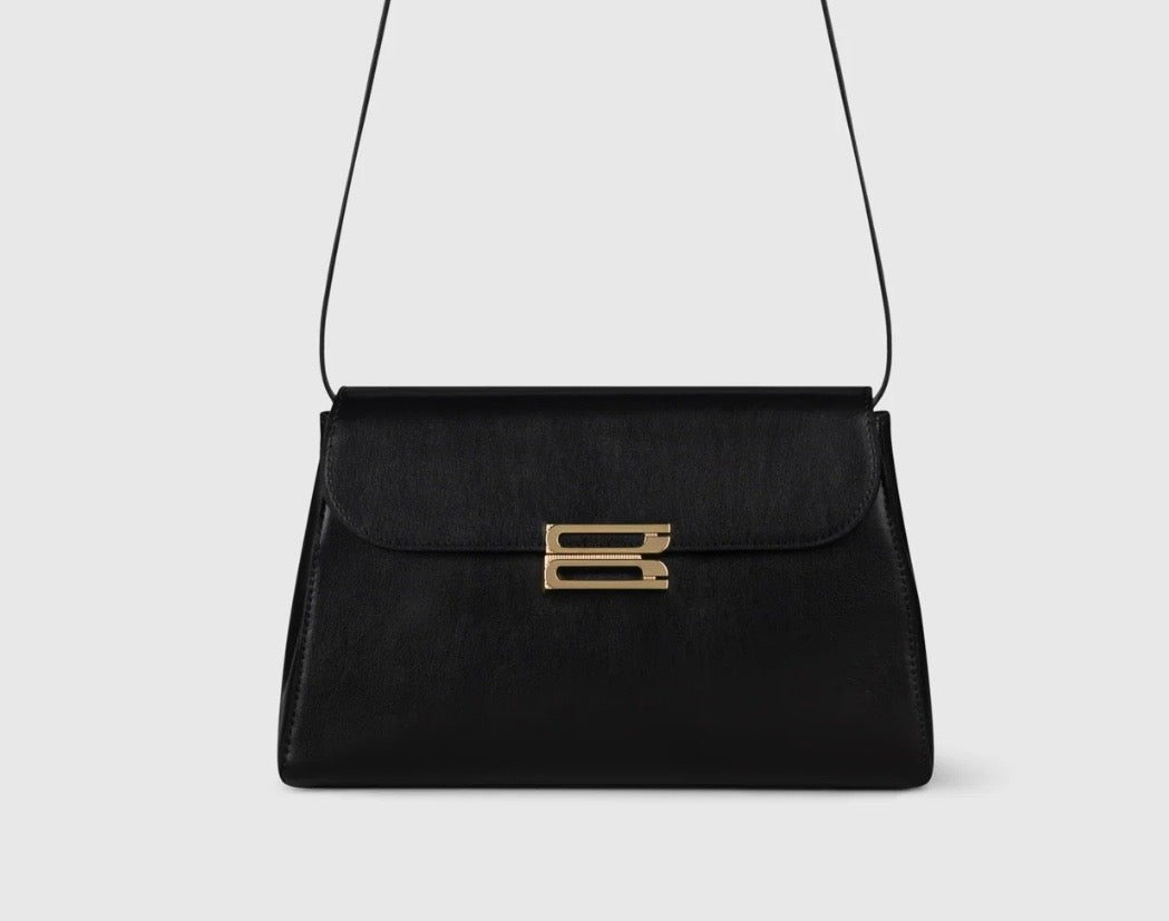 Victoria Beckham structured calf leather handbag — Archive Essentials Contemporary Edit care guide