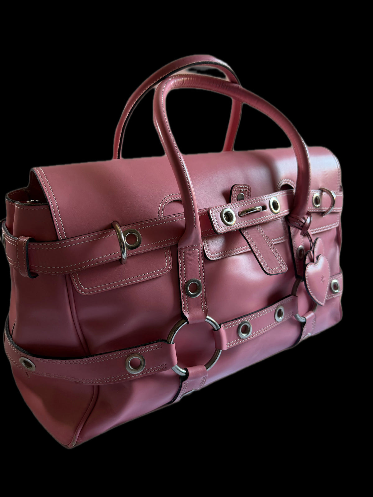 A vintage pink Mulberry x Luella Gisele handbag, featuring heavy buckle hardware and a slouchy silhouette — an iconic Y2K archive piece.