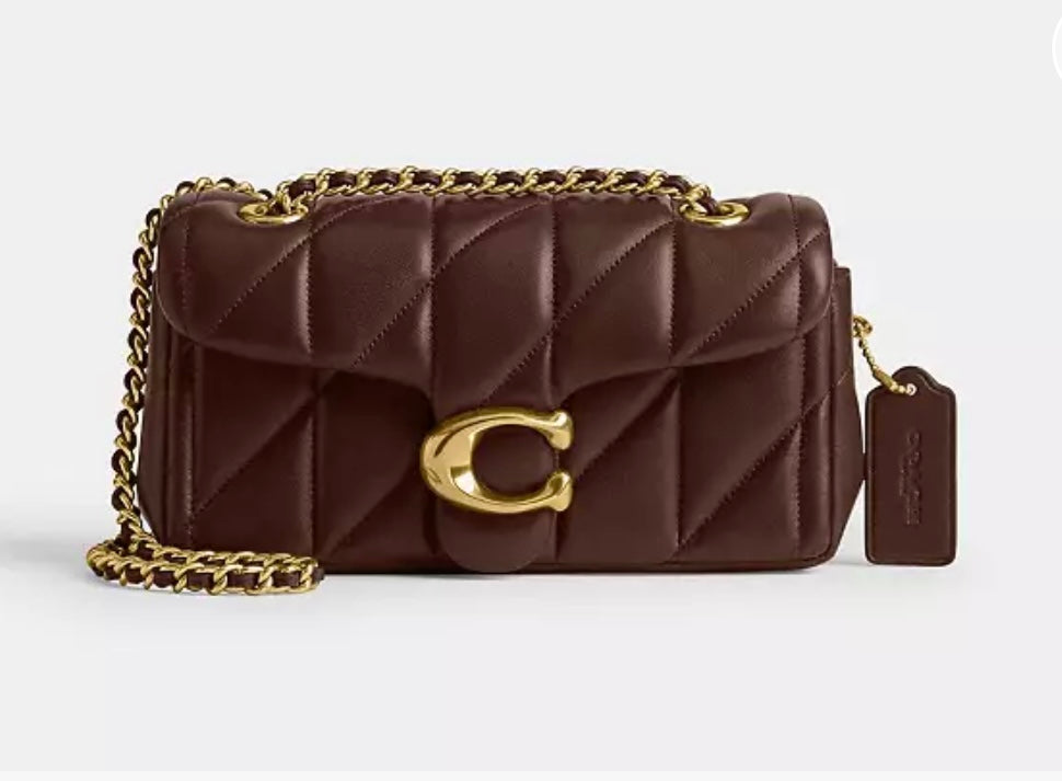 Dark brown Coach Tabby Shoulder Bag 20 with pillow quilting, gold-tone chain strap and C-shaped clasp.
